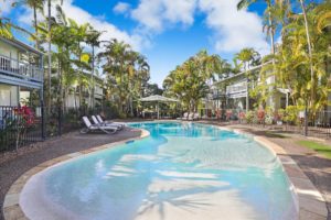 Trpoical setting for lagoon style pools at Coral Beach Noosa Resort