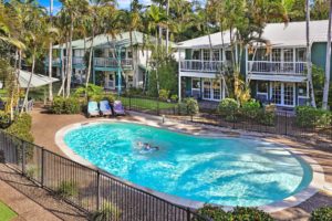 Three lagoon style pools at Coral Beach Noosa Resort